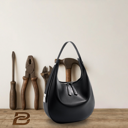 BERK | Crescent-shaped bucket bag made from genuine leather